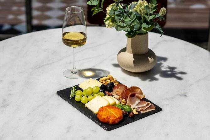 Porto Wine Tasting Experience with Portuguese Tapas Plate - The food pairing: Portuguese cheese and cured ham with jams