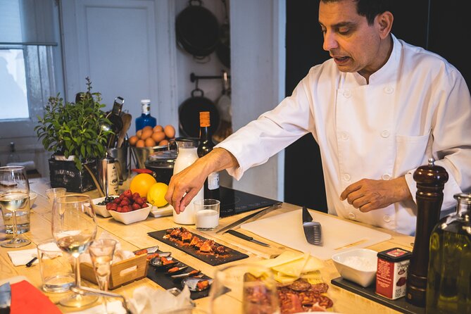 Premium Paella Cooking Class & 10 Spanish Tapas - Entering a Barcelona apartment kitchen (and finding it on time)