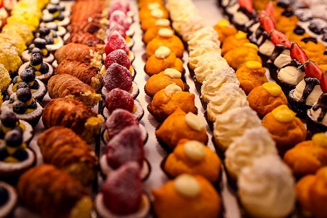 Private Bologna Food & Market Tour with 6 Tastings & Wine - Palazzo della Mercanzia: Start With a Market-Era Powerhouse