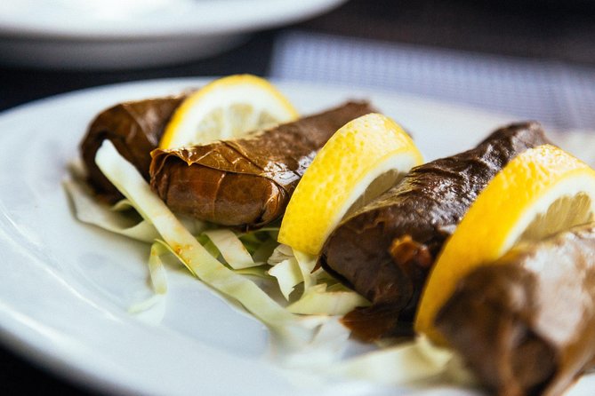 PRIVATE Food Tour: The 10 Tastings of Dubai With Locals - Al Souq Al Kabeer and the Hindu Temple complex at Bur Dubai creek