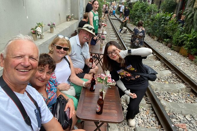 Private Half-Day Hanoi Food Tour by Motorbike - Stop 4: Duờng Tau (Train Street) for coffee and photo energy
