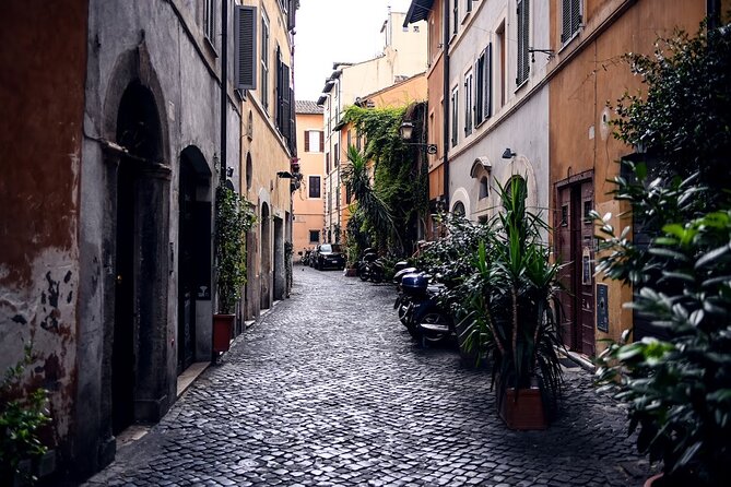 Private Rome Food Tour in the Historic Centre with 8+Tastings - Ancient walkway remains from the 2nd century B.C.: reading Rome on foot