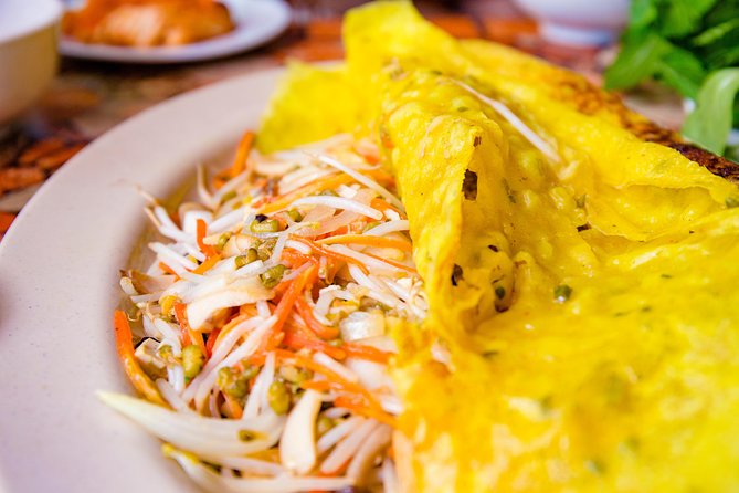 Private Vegan Food Tour By Scooter in Ho Chi Minh City - Meeting at 5:30 PM and riding safely through HCMC traffic