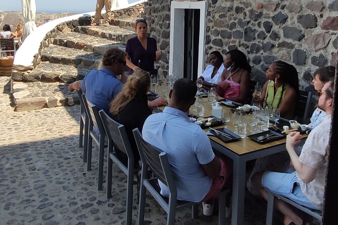 Private Wine Tour in 3 Wineries with 12 Wine Tastings and Tapas - Venetsanos Winery: Gravity-Fed Production and Caldera-Edge Sunset Views