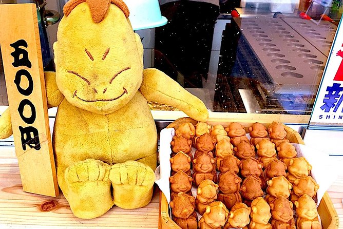 Retro Osaka Street Food Tour: Shinsekai - Walking landmarks: Billiken shrine, Jan Jan Yokocho, and Isshin-ji