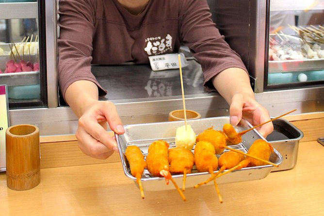 Retro Osaka Street Food Tour: Shinsekai - Tower Knife Osaka to Kuromon Ichiba Market: the market payoff