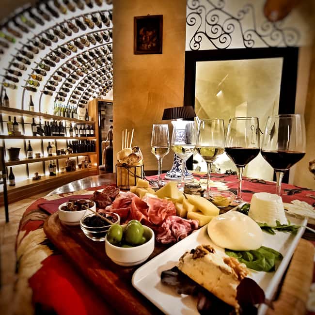 Rome: Food Tasting and Wine Pairing & Tiber River Boat Ride - Entering Cantina Fabullus: Trastevere’s cistern tasting setup
