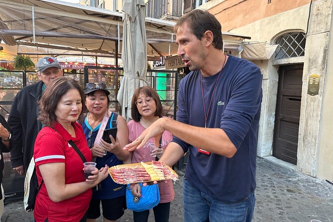 Rome Food Tour: Hidden Gems of Trastevere with Dinner & Wine - Stop 2: Trastevere Street Food and a Baccalà Lesson