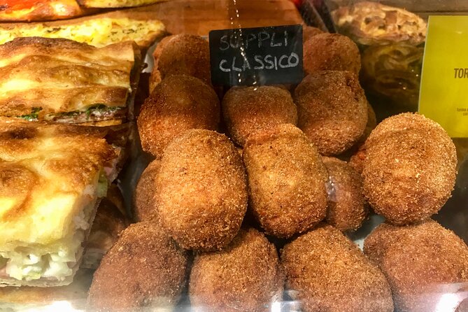 Rome Street Food Tour with Local Guide - Il Portico di Ottavia and the 1st-century context