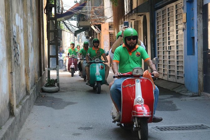 Saigon After Dark Vespa Street Food Tour + Live Music 4 hours - Stop 3: Banana cake and how street food tells a story