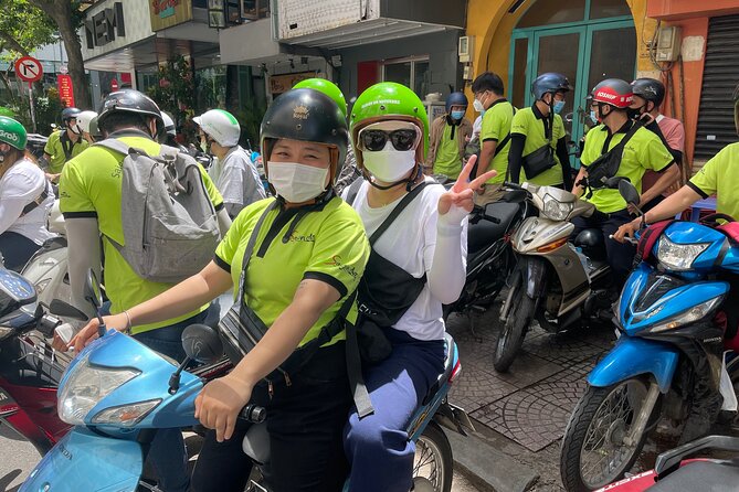 Saigon Afternoon Unseen Street Food by Scooter |Opt: Ao Dai Rider - The Route Highlights That Make This Tour Work