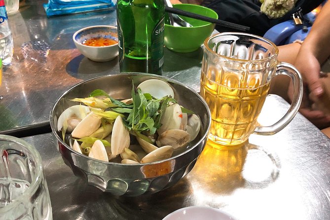 Saigon By Night and Street Food By Motorbike | Opt: Ao Dai Riders - How a motorbike turns Saigon street food into a night you remember