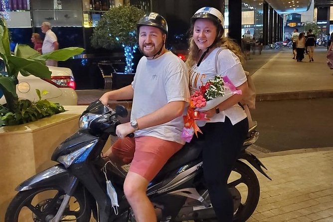 Saigon Evening Food Tour by Scooter - Flower market at night: a quick walk with big visual payoff