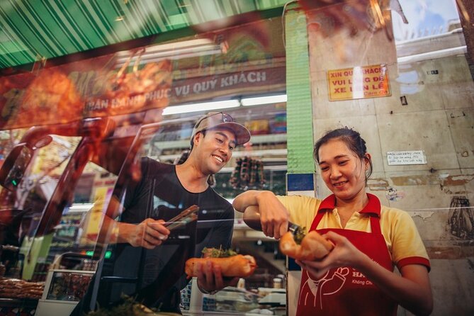 Saigon Night Bites on Foot: Local Vendors, Stories & Sweet Finish - Entering District 1 at 5:00 pm Without the Stress