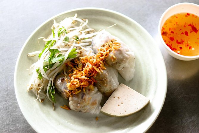 Saigon Night Street Food and City Tour on Scooter - Stop 1 and the ride briefing: settle in before you taste anything