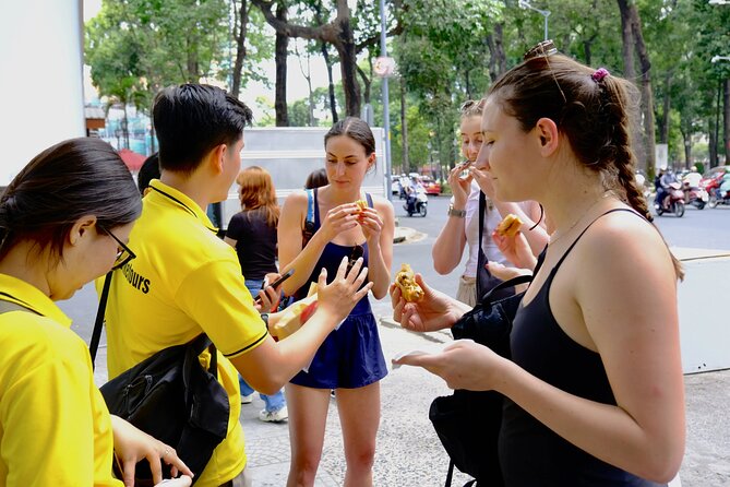 Saigon Sight & Food Tour By Day (Private Tour) - Tan Dinh Church and two markets: pink church photos and real shopping aisles