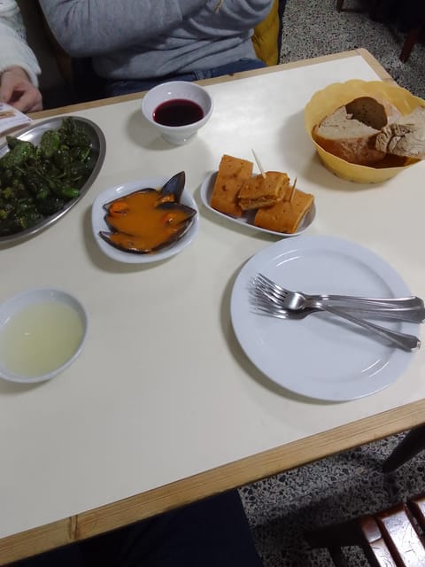 Santiago: Guided Foodie Tour with Drinks, Tapas & Live Music - What you’ll eat: Galician classics (with seafood in the mix)