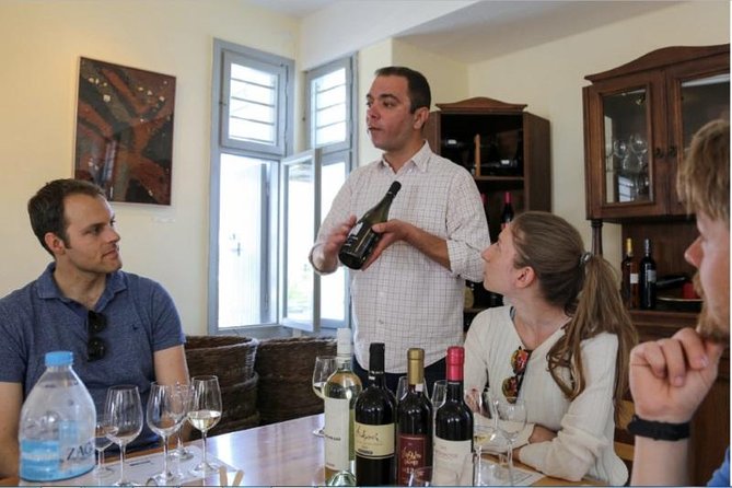 Santorini Wine Adventure with 12 Wine Tastings, Tapas and Sunset - Stop-by-stop: how three estates turn into one guided tasting story