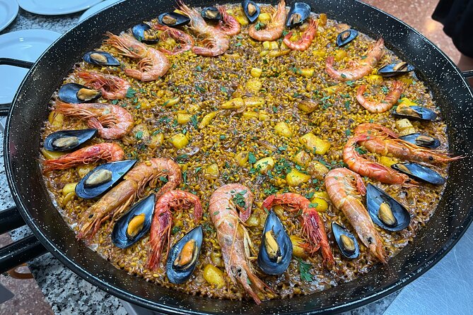 Seafood paella cooking class, tapas and visit to Ruzafa market. - The full meal: paella plus wine, salad, dessert, and coffee