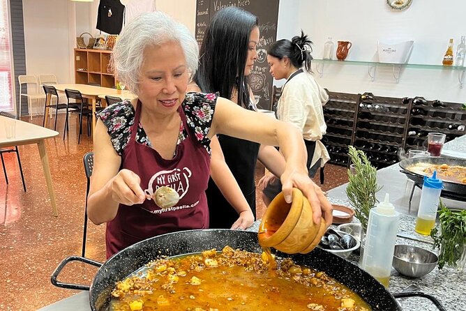 Seafood paella cooking class, tapas and visit to Ruzafa market. - Price, timing, and small tips for a smooth day
