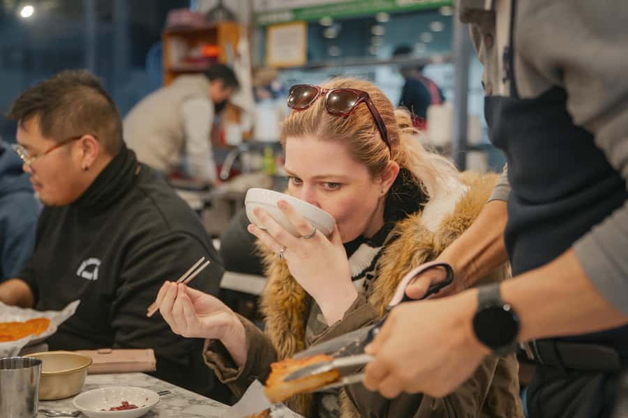 Seoul: Palace, Temple and Market Guided Foodie Tour at Night - Ikseon-dong Hanok Village: short stops that save your time