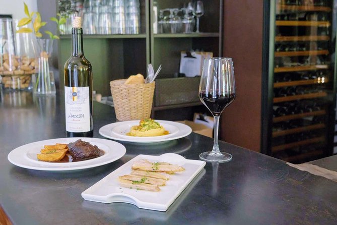Sevilla Food Tour: Tapas, Wine, History & Traditions - Stop 6 at Santa María la Blanca: grandma-style cooking and Betis talk