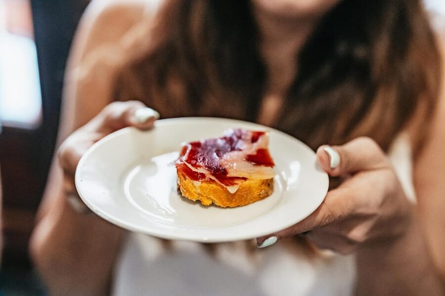 Seville: Tapas, Taverns and History Guided Walking Tour - Taberna Álvaro Peregil: manchego, pork belly, and famous orange wine