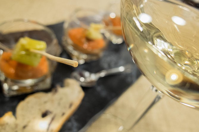 Seville Wine & Gourmet Tapas Tour by Food Lover Tour - Stop 1 and Stop 2: two bodegas and the tapas crawl method