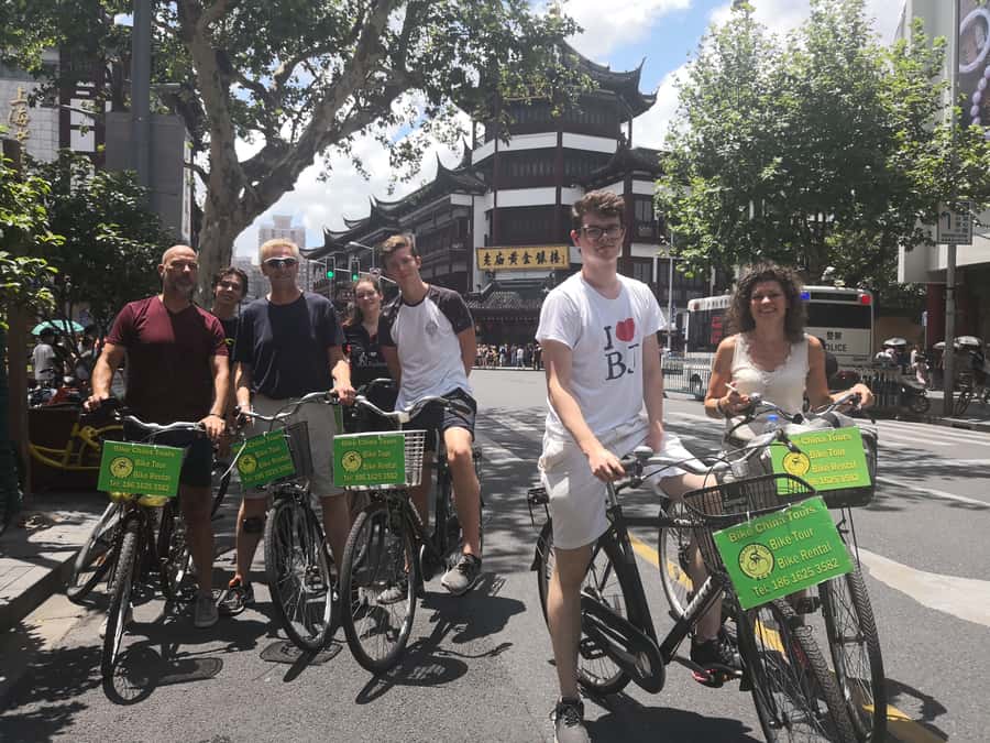 Shanghai Must-See and Foodie Test Bike Tour( Day & Night) - Bicycles, helmets, pace, and group size you can actually handle