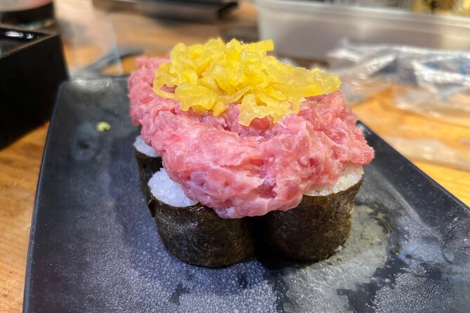 Shinjuku: Food Tour – 15 Dishes at 4 Eateries - Godzilla Head Photo Stop: The Quick Cinematic Moment