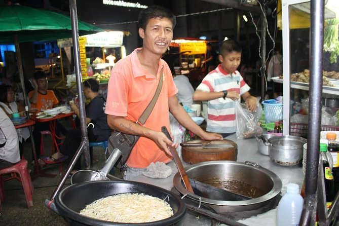 Small-Group Chiang Mai Evening Street Food Tour - Itinerary feel: markets, food stands, and hop-on-hop-off songthaew rides
