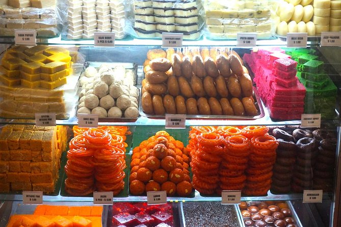 Small-Group Food Tour With Hawker Center: Eat Like A Local - Heat, rain, and walking: how to avoid the common day-killer