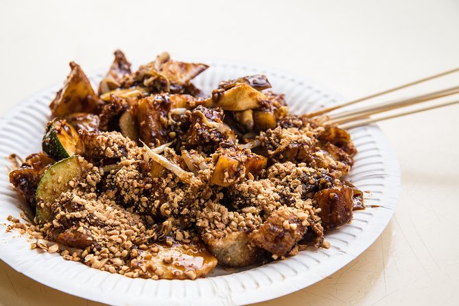 Small Group: Michelin and Local Hawker Food Tour with 9 tastings - Should you book this Michelin and hawker tour at $79.28?