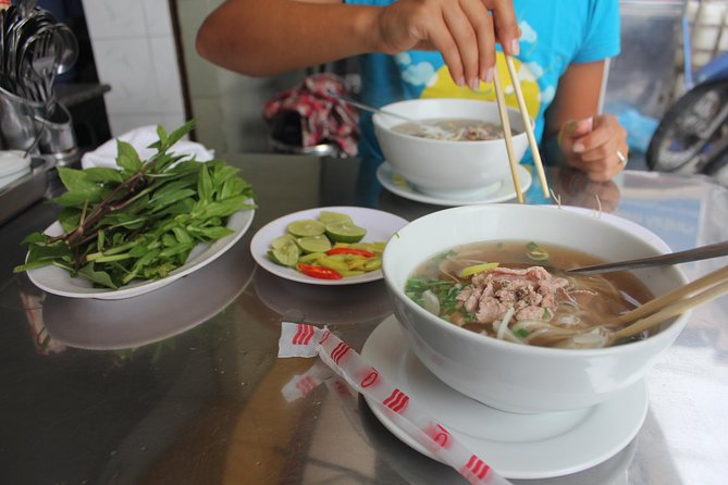 Small-group Street Food Lover by Motorbike (04 hours) - A half-day street food plan built around motorbikes