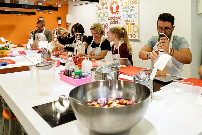 Spanish Cooking Class Paella Tapas and Sangria in Madrid - The Kitchen Plan: Pair Up, Cook for Real, Learn the Steps
