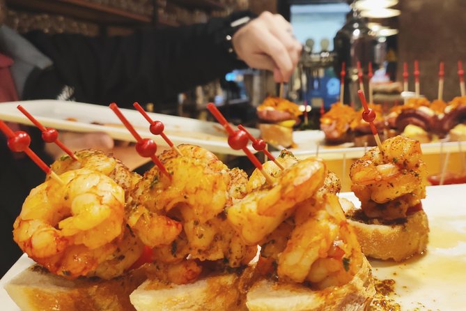 Spanish Wine and Tapas Tour in a Local Neighborhood in Barcelona - From Avinguda del Paral·lel to your first bar stop