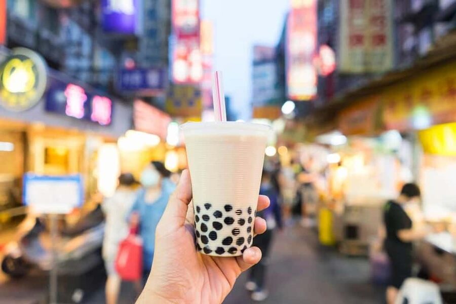 Taipei: Street Food & Hidden Eats Night Market Food Tour - Shida Night Market: pork buns, tofu skin, and spring onion bacon rolls