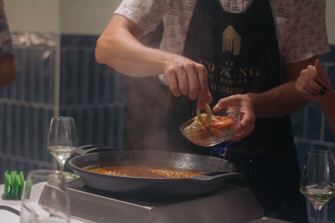 Taste of Spain: Tapas Cooking Class with Bottomless Wine Pairing - Where the evening starts: The Cooking Clubhouse on Atocha