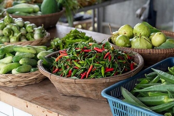 Thai Street Food & Morning Market Walking Tour in Hua Hin - Stop 1 at Feast Thailand: Jok Muu and Café Boran to start