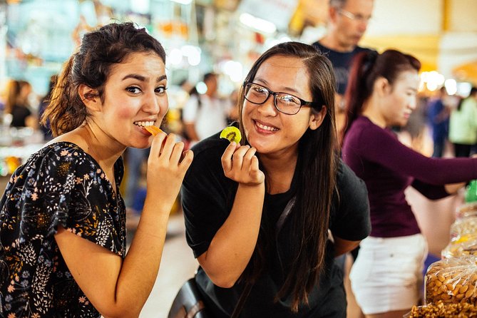 The 10 Tastings of Ho Chi Minh City With Locals: Private Street Food Tour - Independence Palace area: sugar cane juice on a hot-day clock