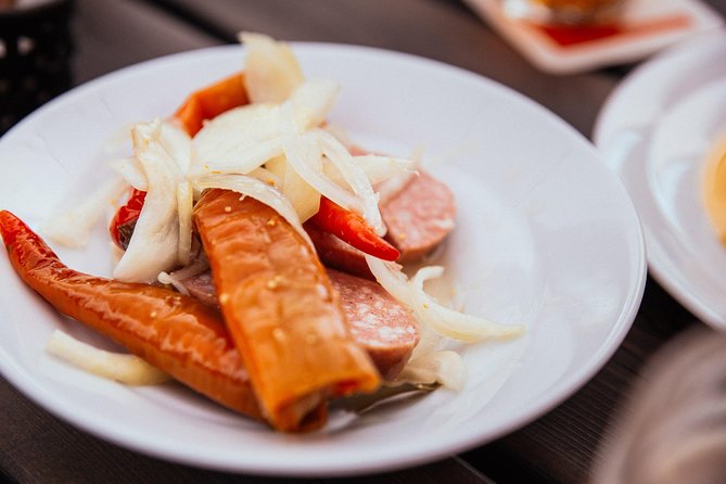 The 10 Tastings of Prague With Locals: Private Food Tour - Stop 3: Žižkov TV Tower and the Korbáčik cheese-and-wine moment