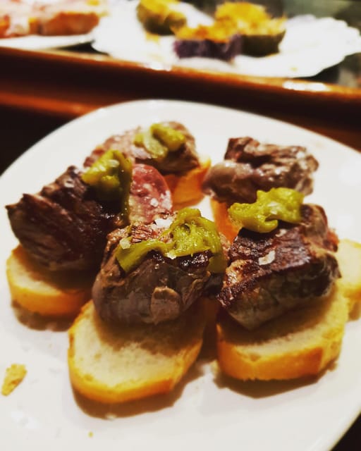 The Original Bilbao Food Tour with Wine Pairings - Stop-by-Stop Flow: Traditional Favorites, Award-Winners, and Chef-Made Specials