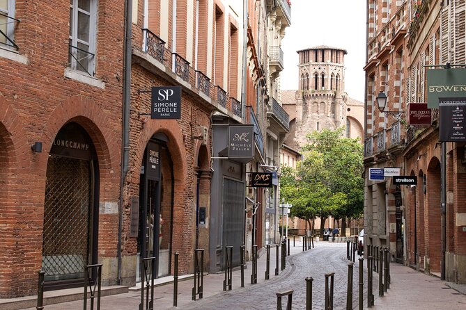 Toulouse Food Tour – A Full French Meal by Do Eat Better - Stop 2: Victor Hugo Market cheeses with real vendor energy