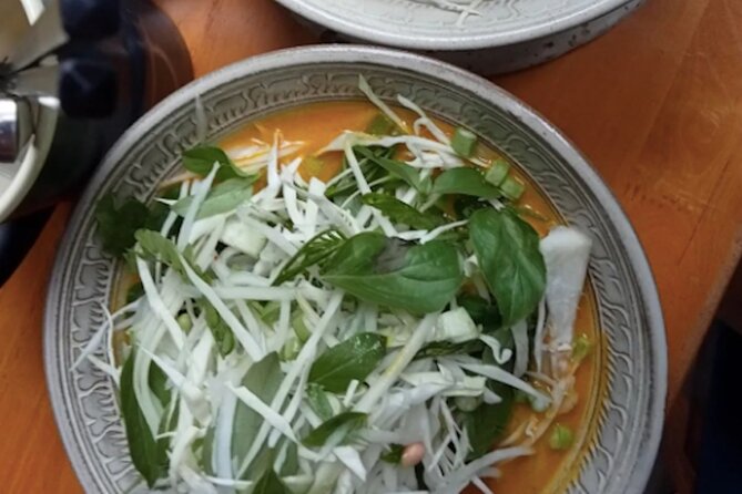 Ultimate Phnom Penh Food Tour by Tuk Tuk: 20 Tastings and Drinks - Stop 5 Wat Phnom: The Main Dinner Feast With Live Music