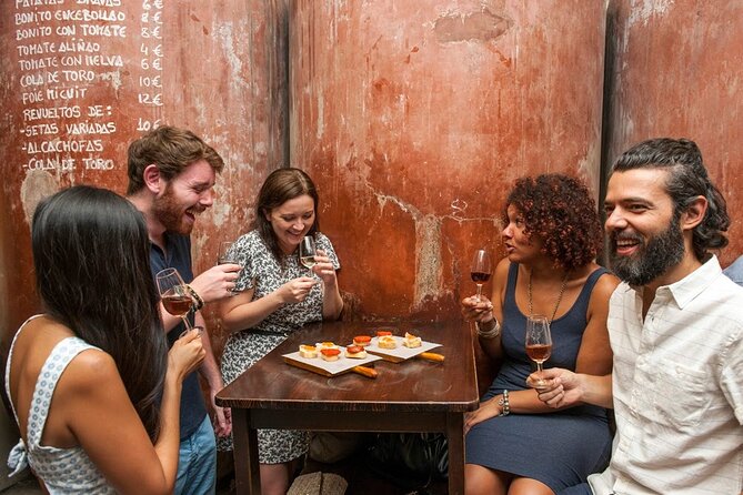 Ultimate Seville Tapas, Wine & History Small Group Tour - Stop 1 at Las Teresas: potato salad, Iberian ham, and sweet red vermouth