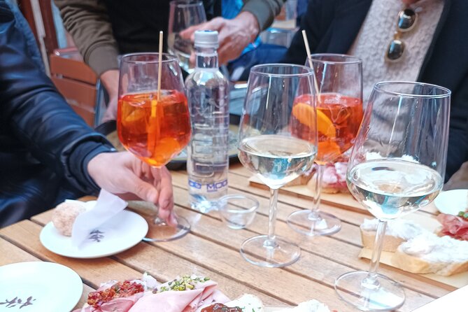 Venice Bacaro Food Tour: Eat and Drink like a Venetian - Stop 3: Calle de la Malvasia at a historic osteria in an alley