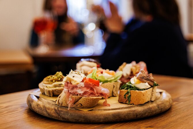 Venice Evening Food Tour: Bites, Drinks & Sit-Down Dinner - Stop 1 at Cantina Aziende Agricole: meat cicchetti and a Select Spritz
