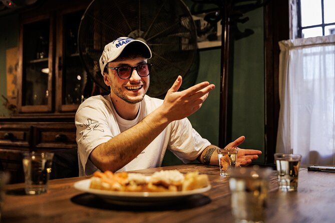 Venice Evening Food Tour: Bites, Drinks & Sit-Down Dinner - Stop 2 on Strada Nova: fish cicchetti and Venetian ombra