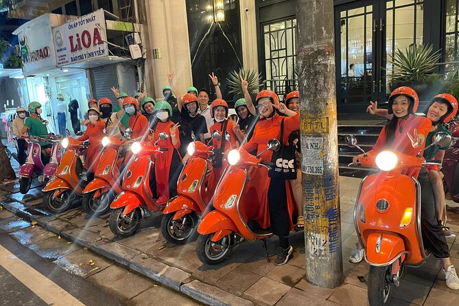 Vespa Female Ao Dai riders Night Street Food + See Train Street - All-female Vespa riding in Hanoi: the practical magic