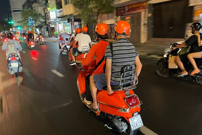 Vespa Female Ao Dai riders Night Street Food + See Train Street - Hồ Trúc Bạch and Ngu Xa street food: where the eating gets serious